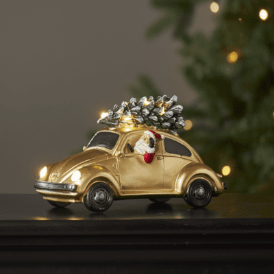 Dekoracja świąteczna Mikołaj w złotym samochodzie