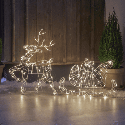 Dekoracja ogrodowa renifer ciągnący sanie
